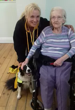 Dog, Mae, with owner Helen and her mother who won Wales' most loyal pet